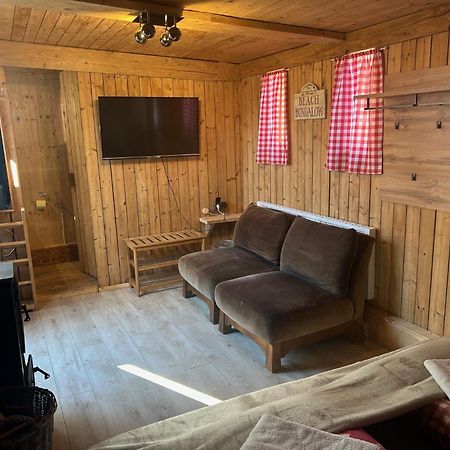 Inn-Side Adventure Cabins Haiming Exterior foto