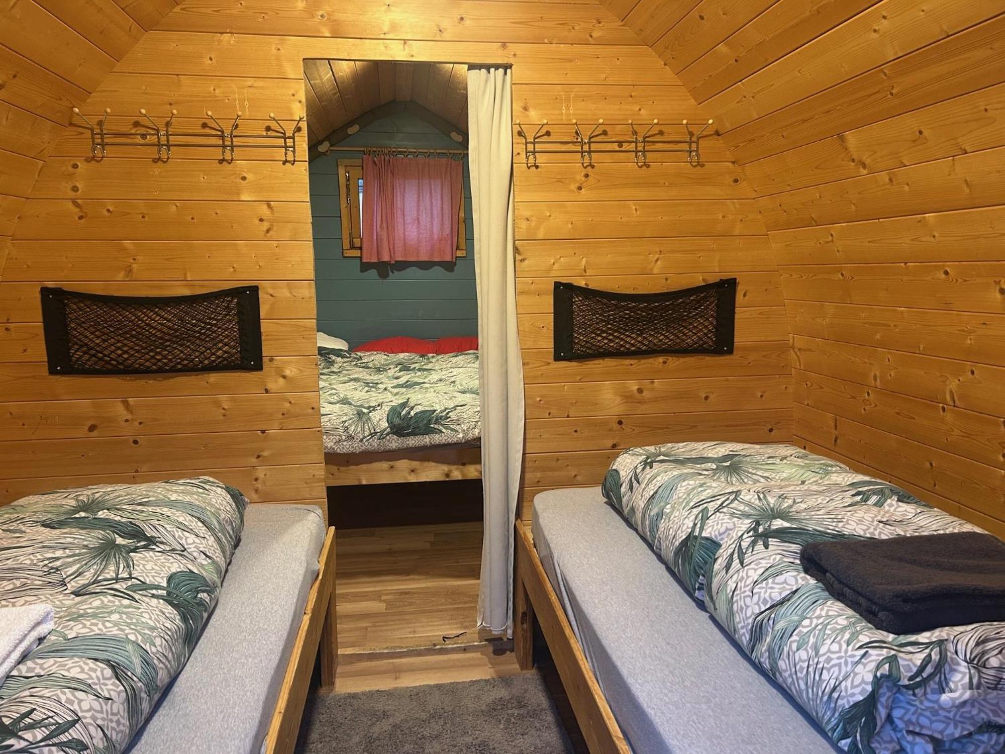 Inn-Side Adventure Cabins Haiming Exterior foto